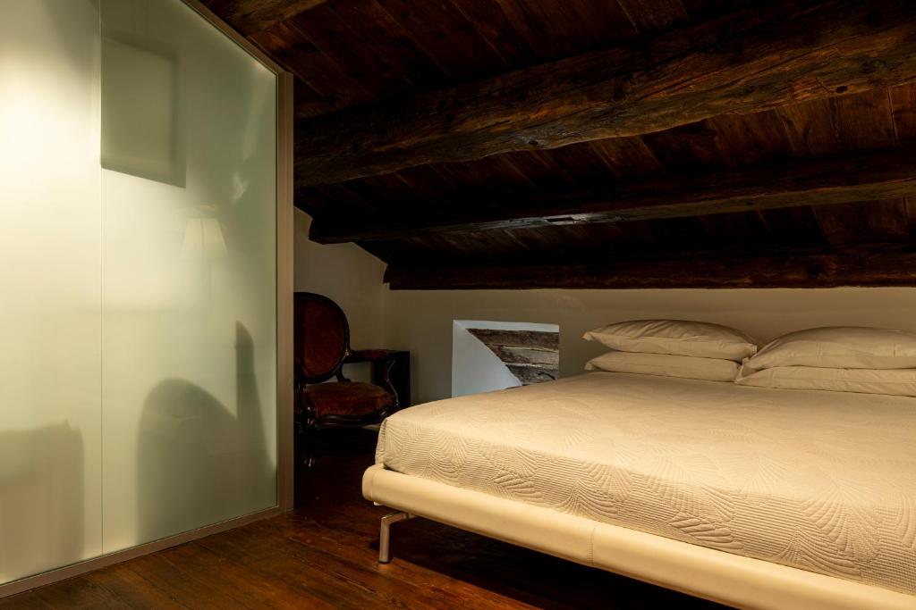Postel nebo postele na pokoji v ubytování Castello Di Semivicoli