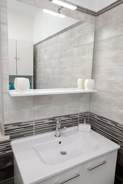 Koupelna v ubytování Rooms Carija
