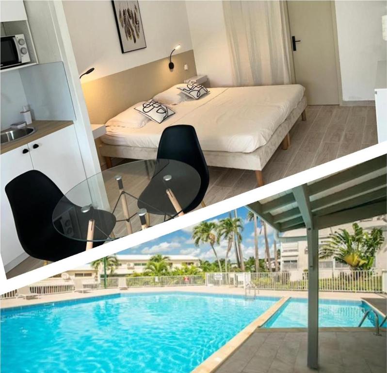 een hotelkamer met een bed en een zwembad bij Superbe studio avec Piscine, au coeur de la Marina! Village Soleil ! in Le Gosier