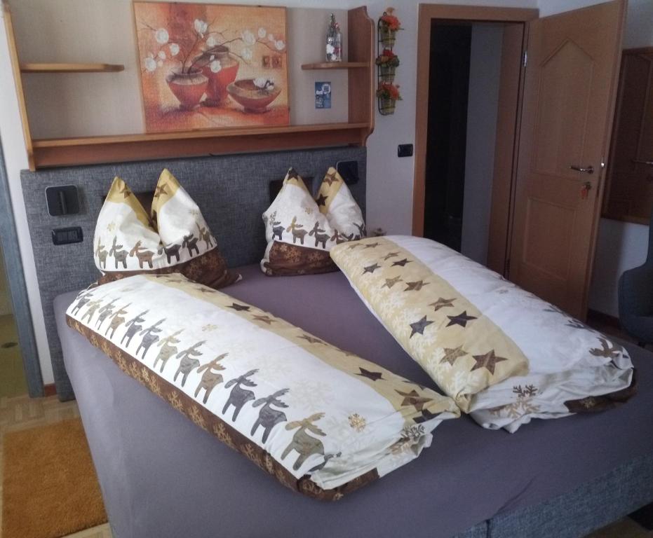 Postel nebo postele na pokoji v ubytování Garni Schwarzenstein