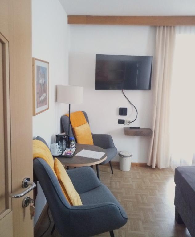 TV a/nebo společenská místnost v ubytování Garni Schwarzenstein