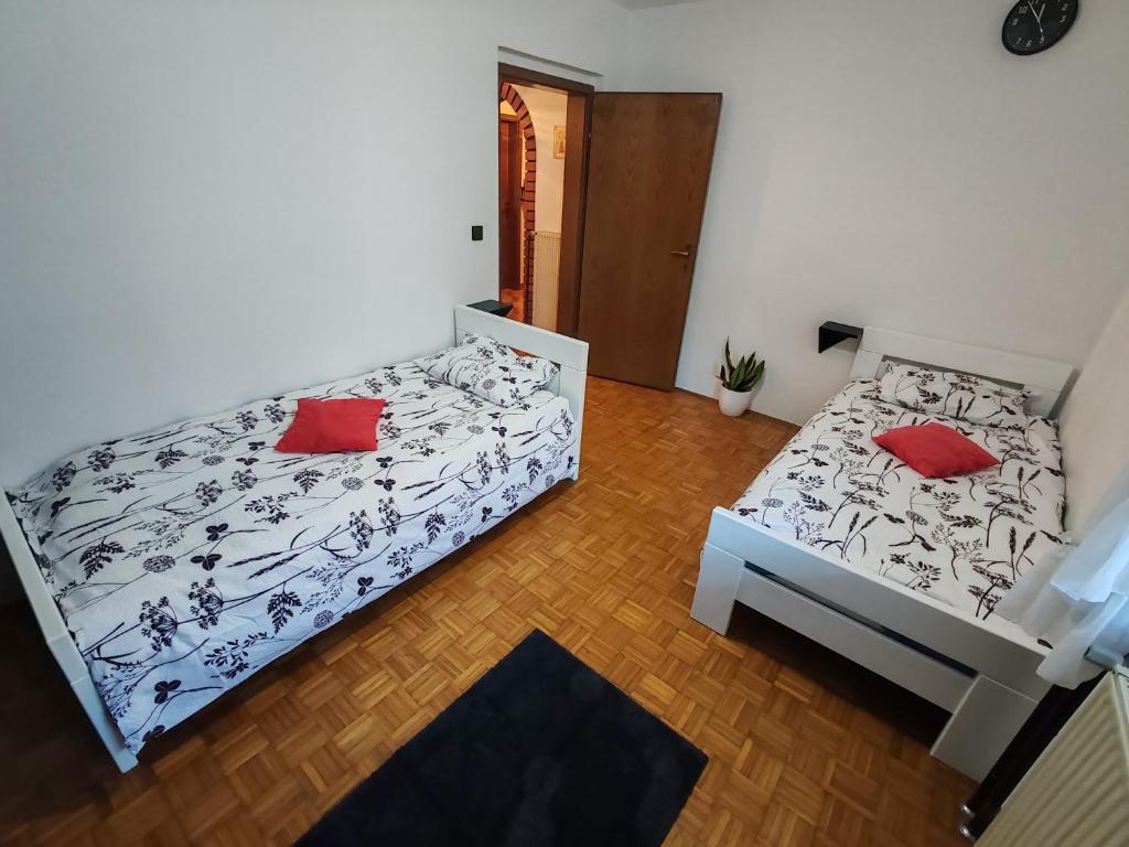 Postel nebo postele na pokoji v ubytování Apartment Prešeren