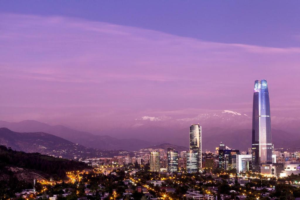 a view of a city at night at Sheraton Santiago Hotel & Convention Center in Santiago