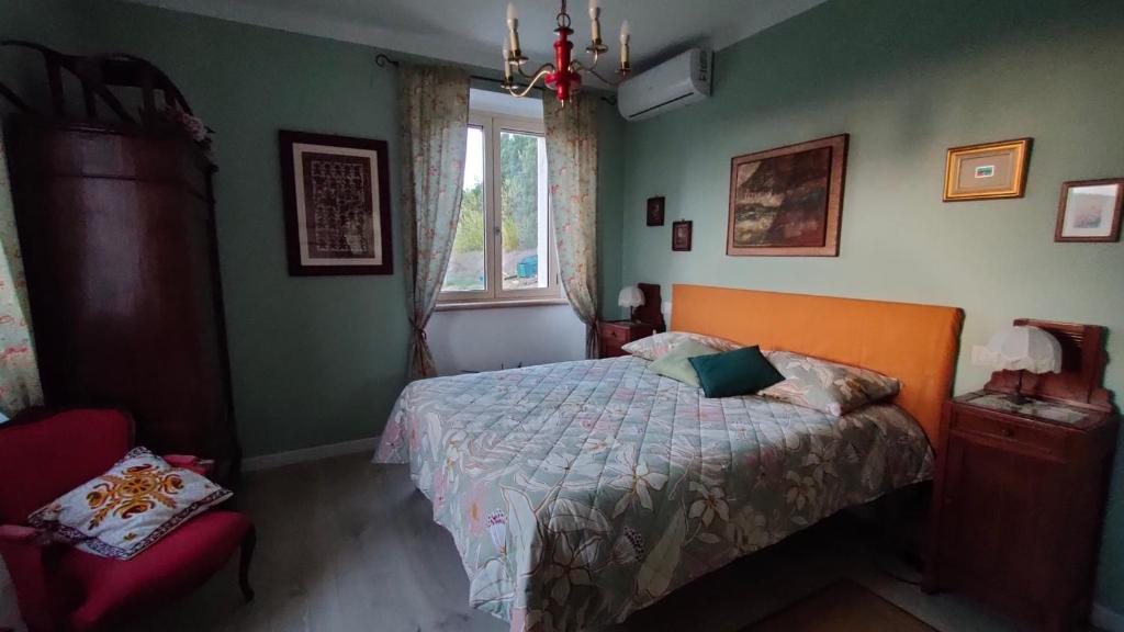 Postel nebo postele na pokoji v ubytování Ai 4 Gelsi B&B