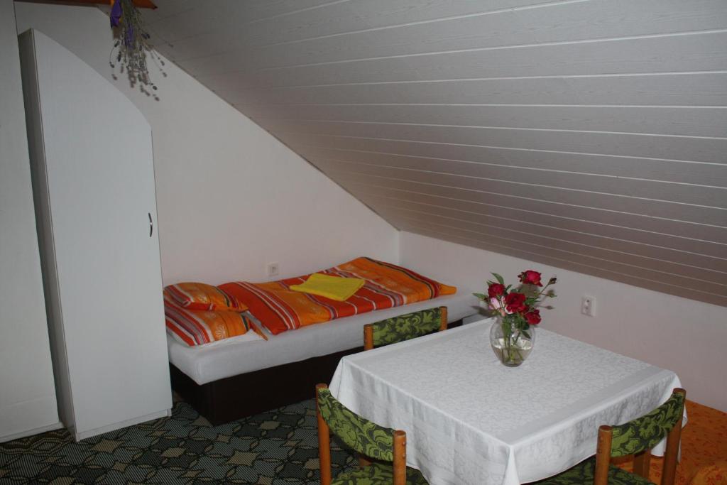 Postel nebo postele na pokoji v ubytování Apartment BENCI