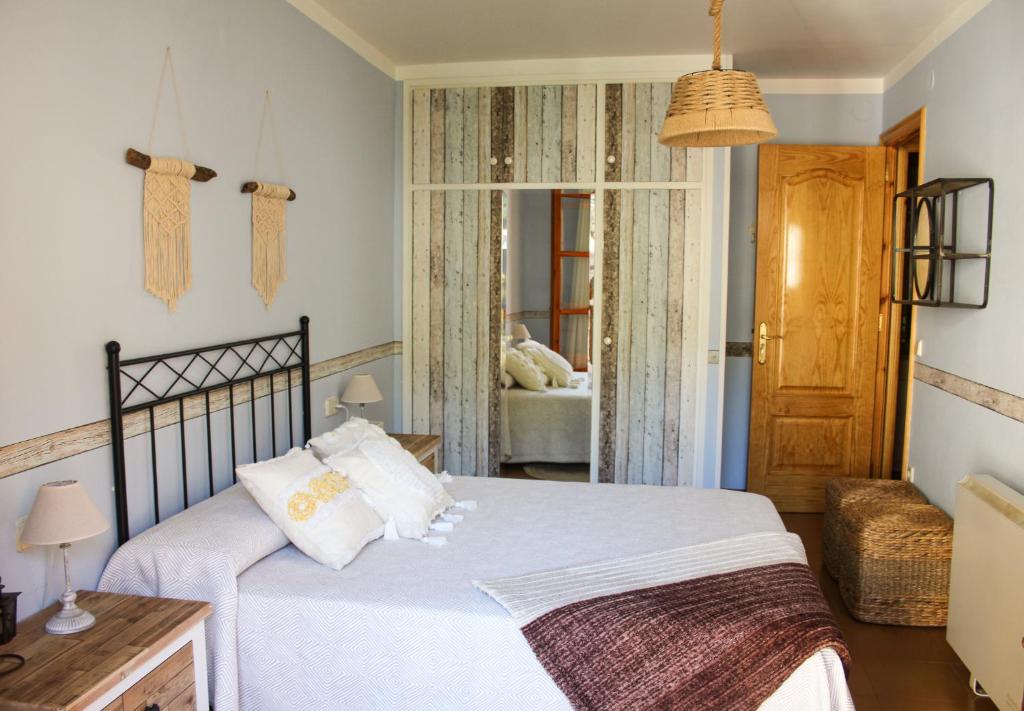 Posteľ alebo postele v izbe v ubytovaní Apartament Montsent