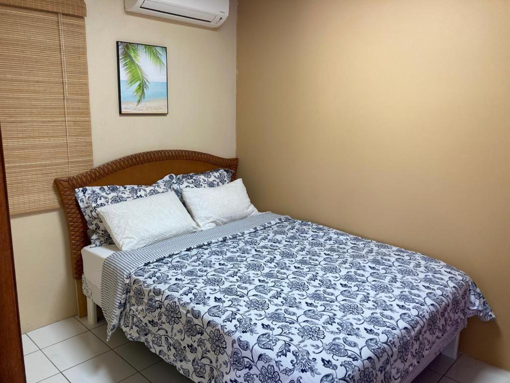 Postel nebo postele na pokoji v ubytování Oranjestad Apartment