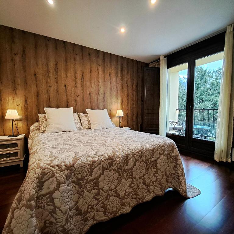 Postel nebo postele na pokoji v ubytování Apartamento con terraza al Puente Romano