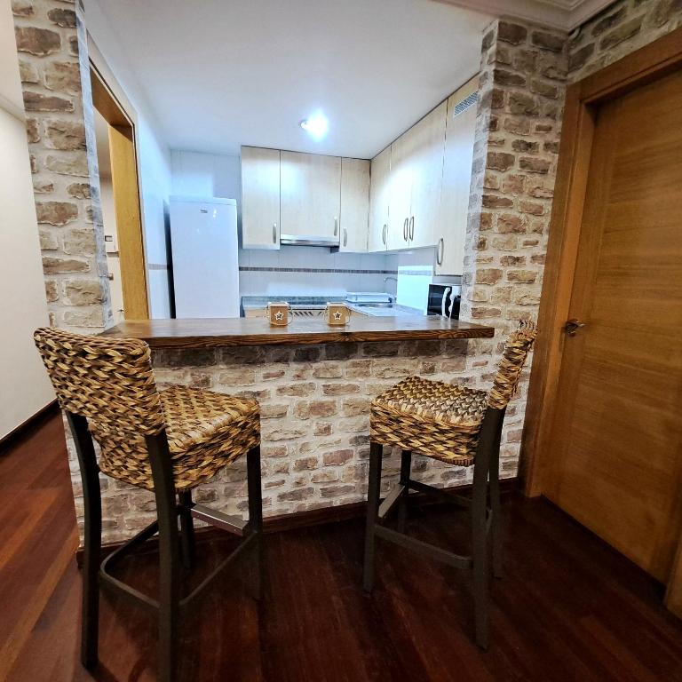 Kuchyň nebo kuchyňský kout v ubytování Apartamento con terraza al Puente Romano