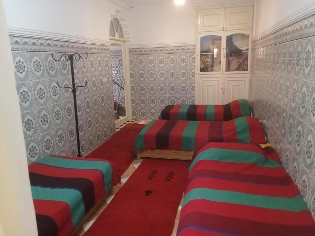 Postel nebo postele na pokoji v ubytování Riad taddert