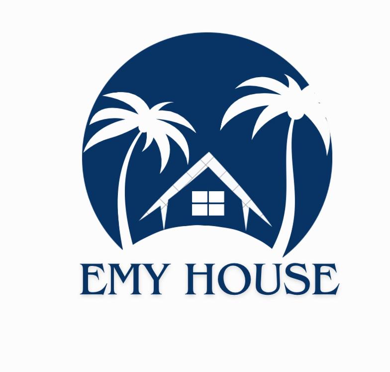 a house and two palm trees in a circle at EMY HOUSE in La Laguna