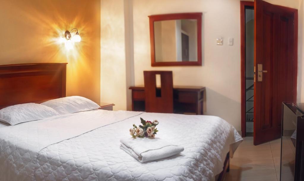 Postel nebo postele na pokoji v ubytování Airport Hotel Guayaquil