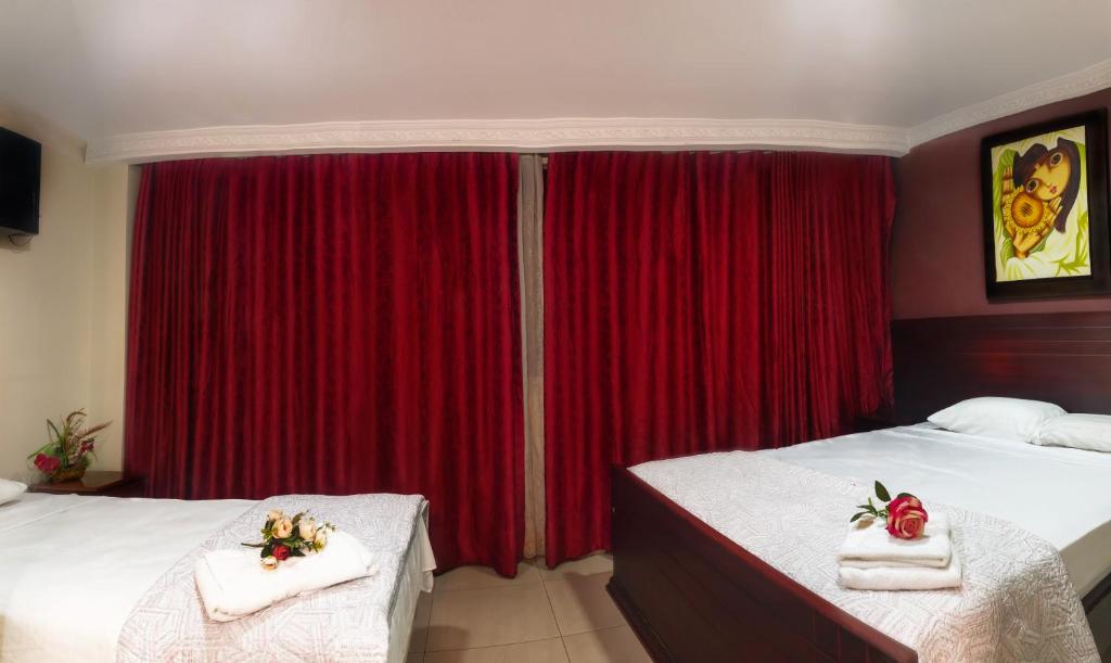 Postel nebo postele na pokoji v ubytování Airport Hotel Guayaquil