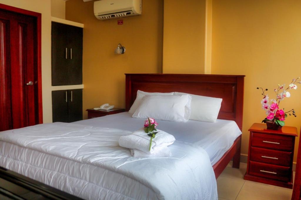 Postel nebo postele na pokoji v ubytování Airport Hotel Guayaquil