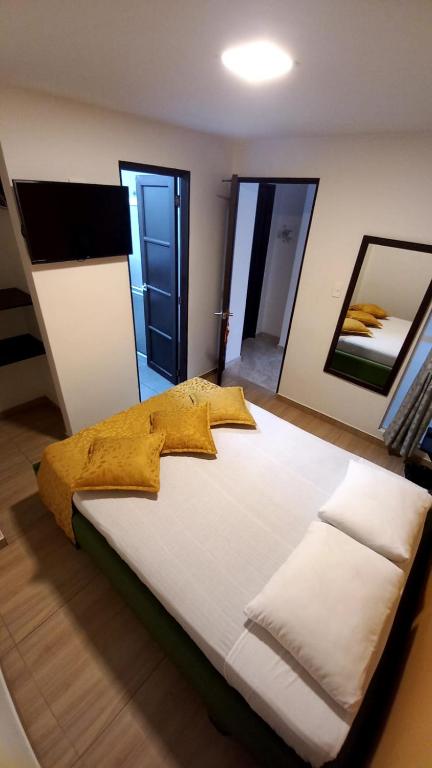 Postel nebo postele na pokoji v ubytování Hotel Anzea