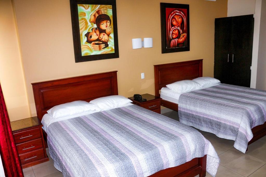 Postel nebo postele na pokoji v ubytování Airport Hotel Guayaquil