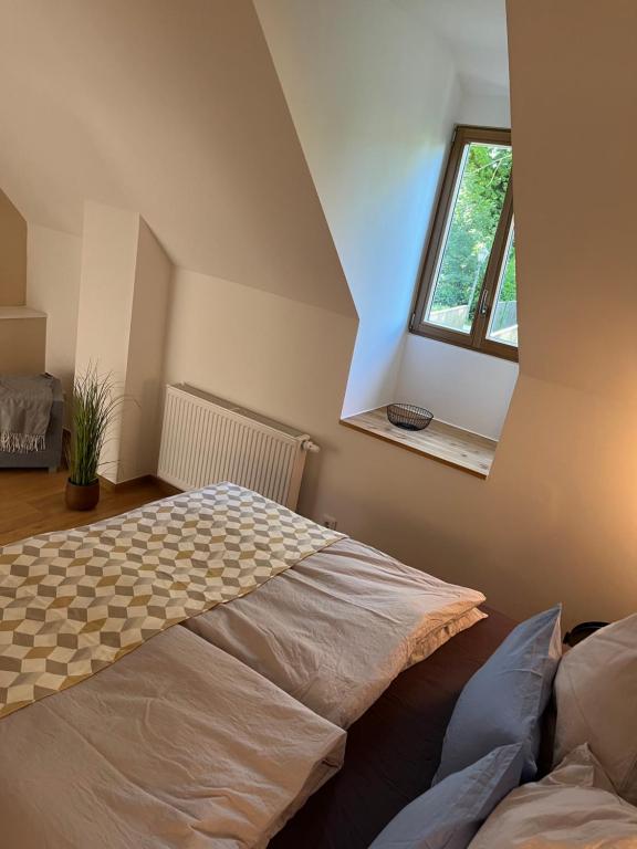 Postel nebo postele na pokoji v ubytování Neu - Wenkheimer Hof Scheunen-Loft