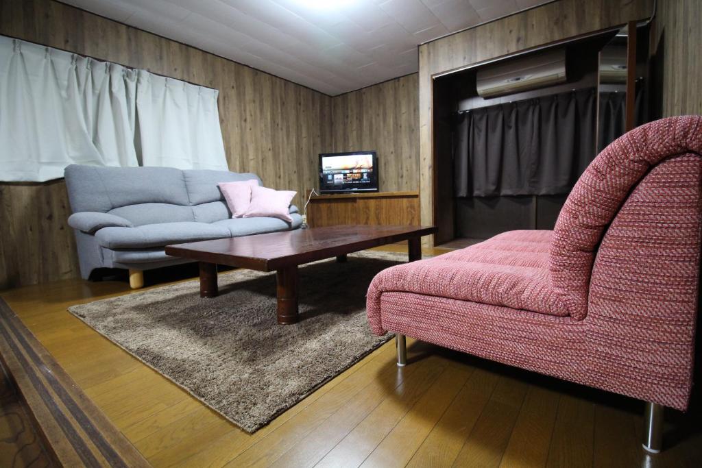 Posezení v ubytování 貸切民泊勝山ベース325 福井県立恐竜博物館まで車で5分