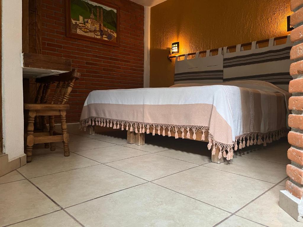 Postel nebo postele na pokoji v ubytování Posada Verona