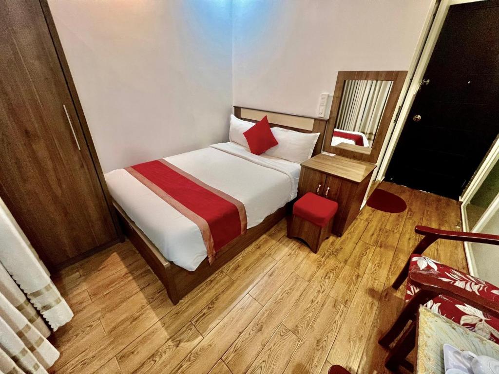 Postel nebo postele na pokoji v ubytování Le Tuan Minh Hotel