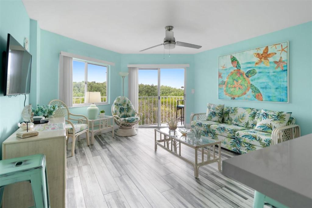a living room with a couch and a table at 1206 Ocean Pointe in Tavernier