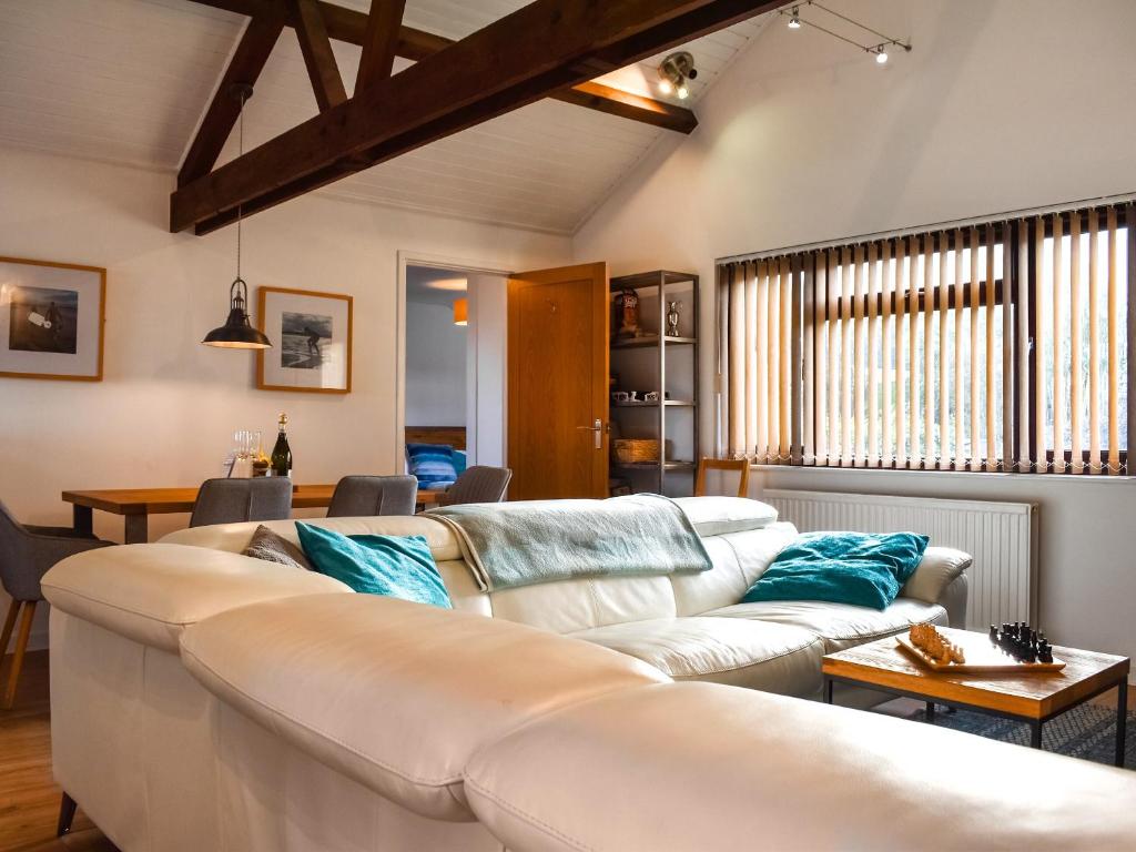 מיטה או מיטות בחדר ב-Fairways Retreat