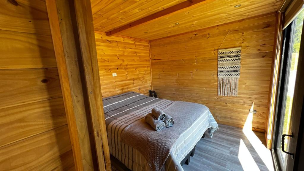 Postel nebo postele na pokoji v ubytování Puerta austral