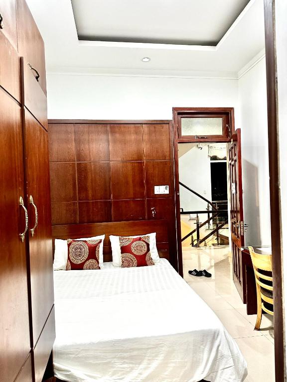 Postel nebo postele na pokoji v ubytování Hoàng Anh hotel