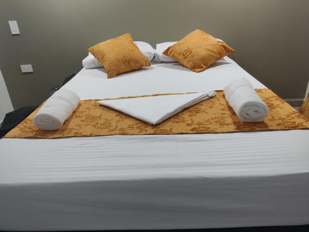Postel nebo postele na pokoji v ubytování HOSPEDAJE EL ENSUEÑO