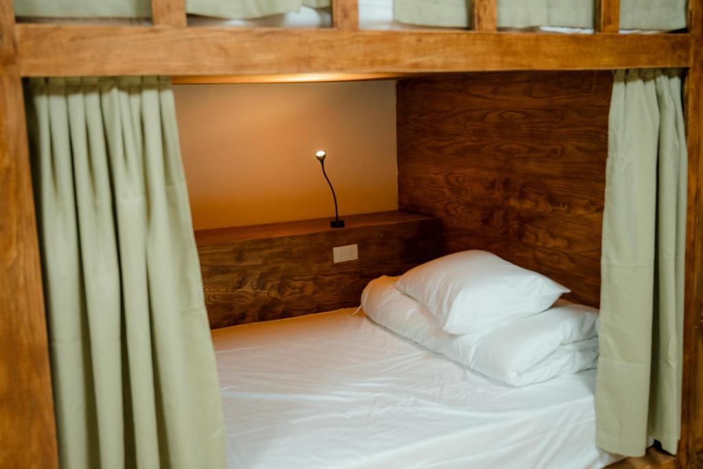 Postel nebo postele na pokoji v ubytování Top of the Loop Hostel Ha Giang