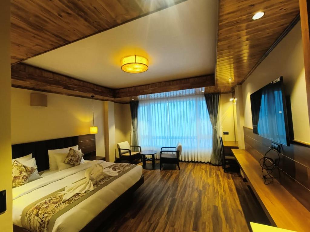Postel nebo postele na pokoji v ubytování Gakhil Boutique Hotel
