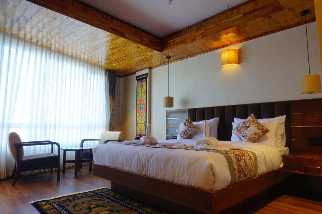 Postel nebo postele na pokoji v ubytování Gakhil Boutique Hotel