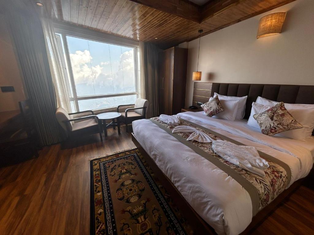 Postel nebo postele na pokoji v ubytování Gakhil Boutique Hotel