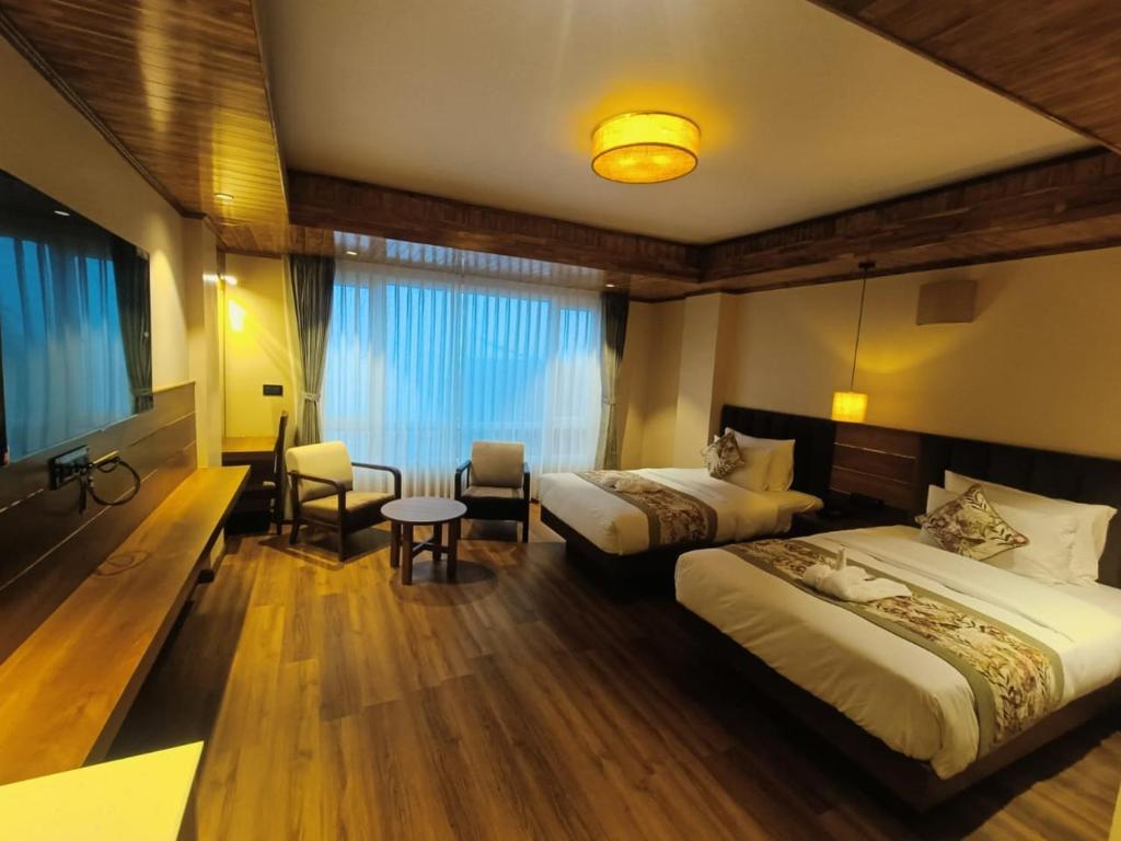 Postel nebo postele na pokoji v ubytování Gakhil Boutique Hotel