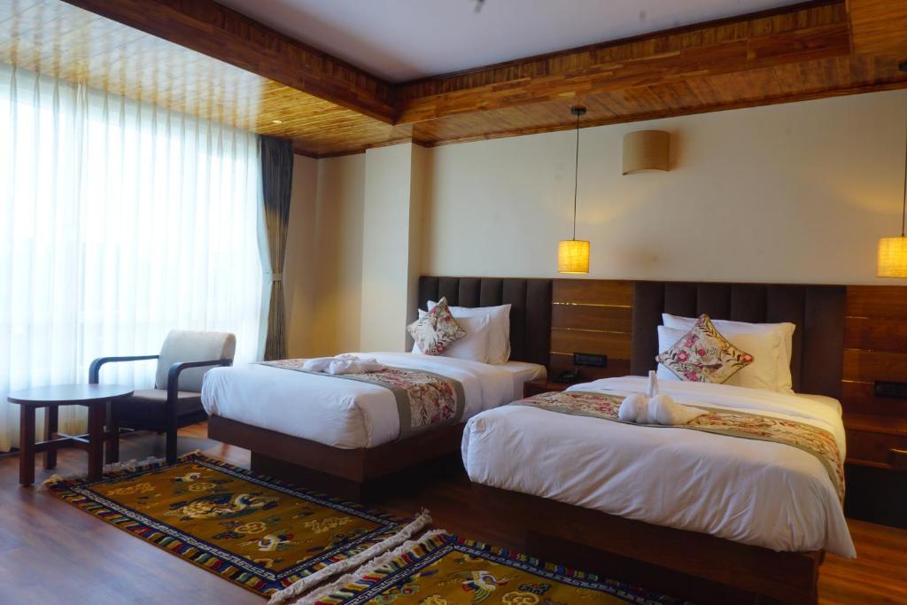 Postel nebo postele na pokoji v ubytování Gakhil Boutique Hotel