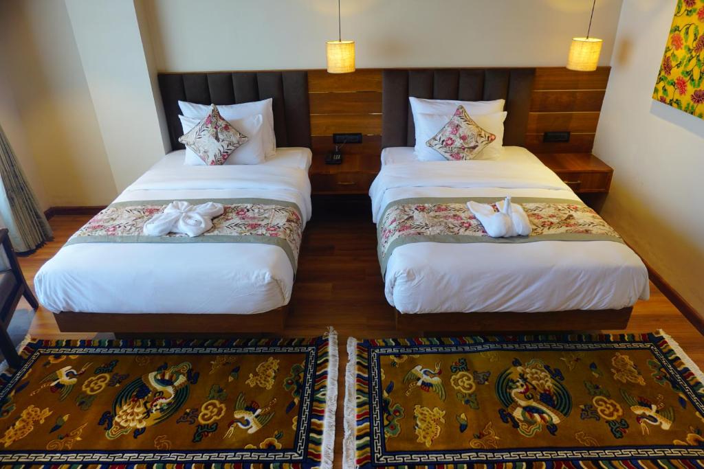 Postel nebo postele na pokoji v ubytování Gakhil Boutique Hotel