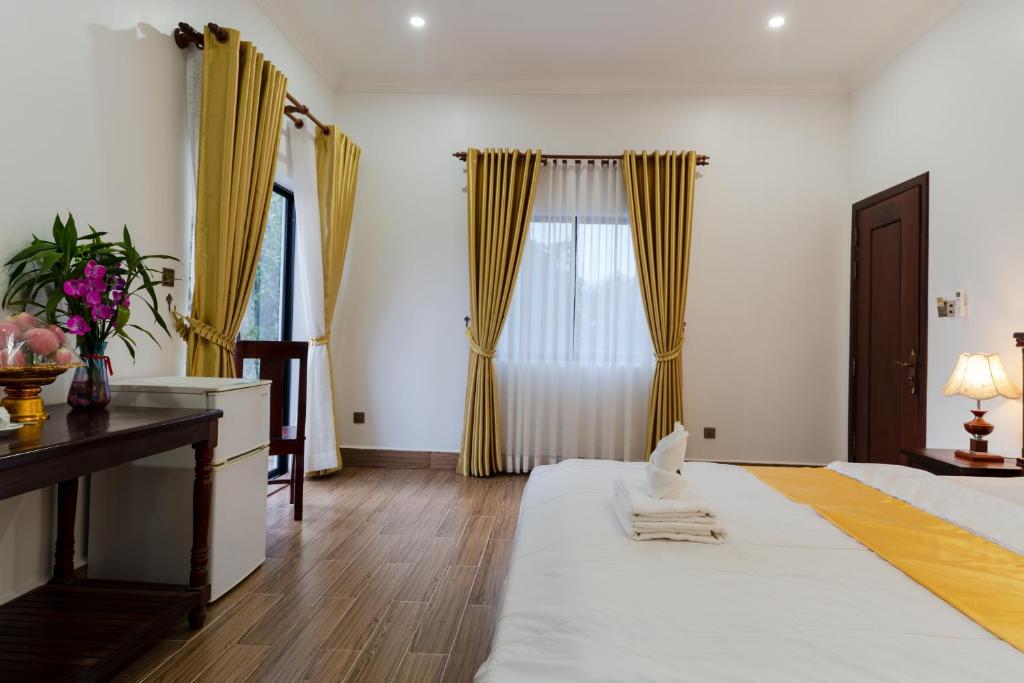 Postel nebo postele na pokoji v ubytování 855 Villa S R
