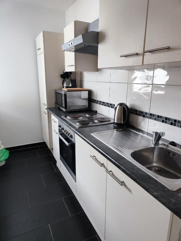 Kuchyň nebo kuchyňský kout v ubytování Apartment Fewo Irdning Pichlarn