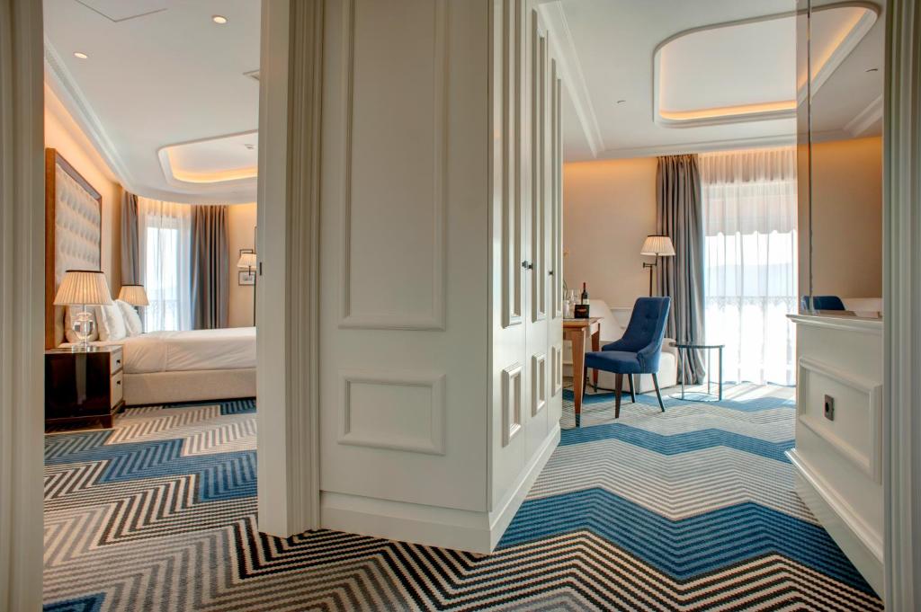Postel nebo postele na pokoji v ubytování Boutique Hotel La Roche