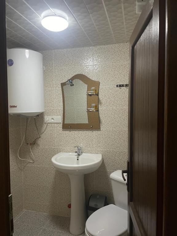 Koupelna v ubytování Hotel-Cafe Koshki Ushguli
