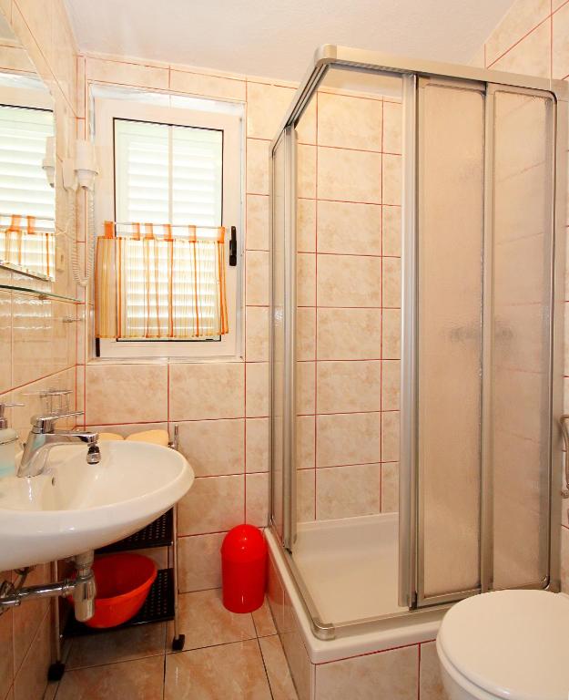 Koupelna v ubytování Apartment Vucic
