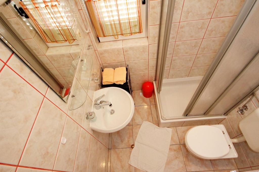 Koupelna v ubytování Apartment Vucic