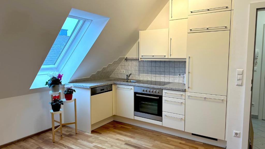 Kuchyň nebo kuchyňský kout v ubytování City Apartment Sankt Pölten