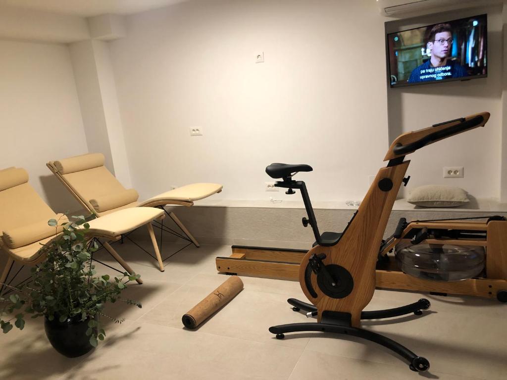Posilňovňa alebo fitness centrum v ubytovaní Apartments villa Ladini
