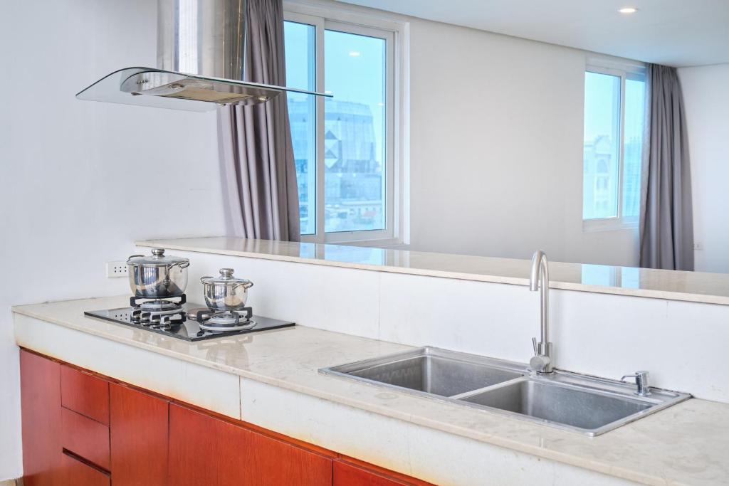 Kuchyň nebo kuchyňský kout v ubytování A25 Hotel - 12 Ngô Sỹ Liên