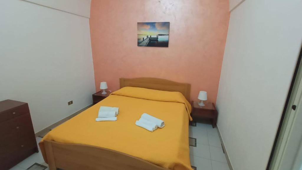 Postel nebo postele na pokoji v ubytování Due passi dal Castello