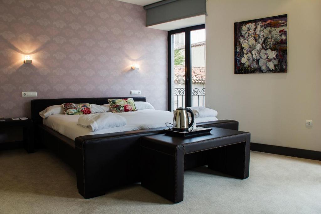 Postel nebo postele na pokoji v ubytování Hotel Teratermal