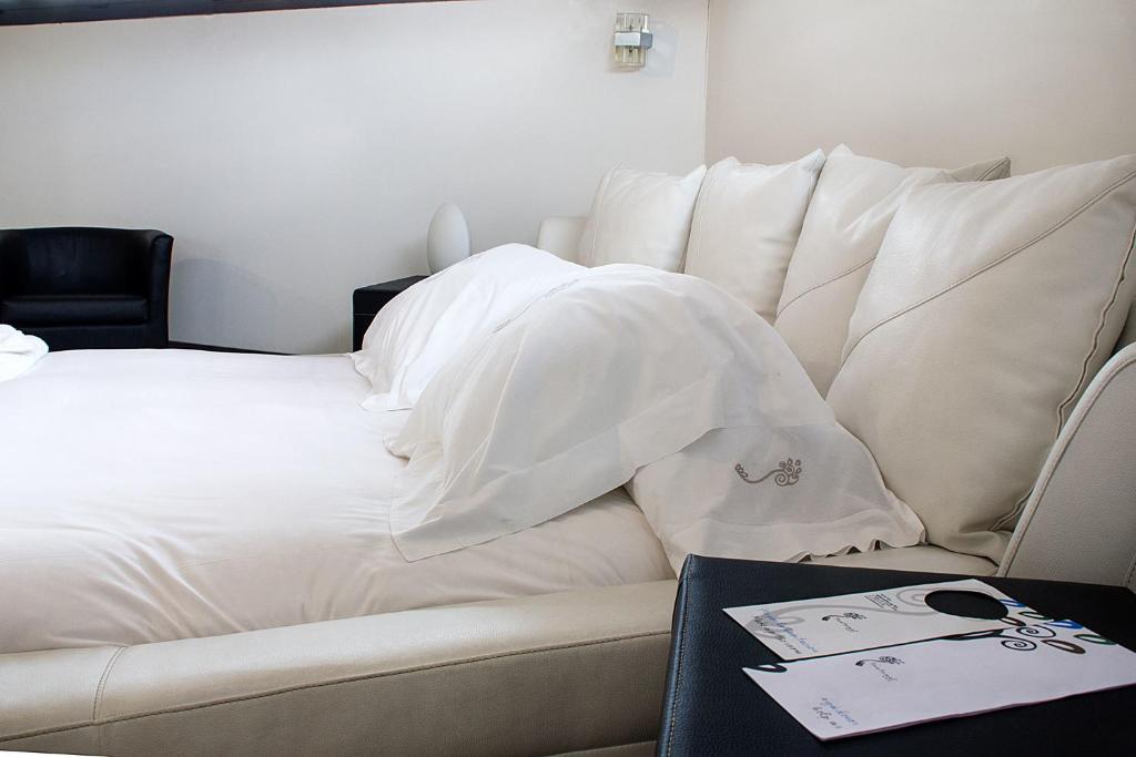 Postel nebo postele na pokoji v ubytování Hotel Teratermal
