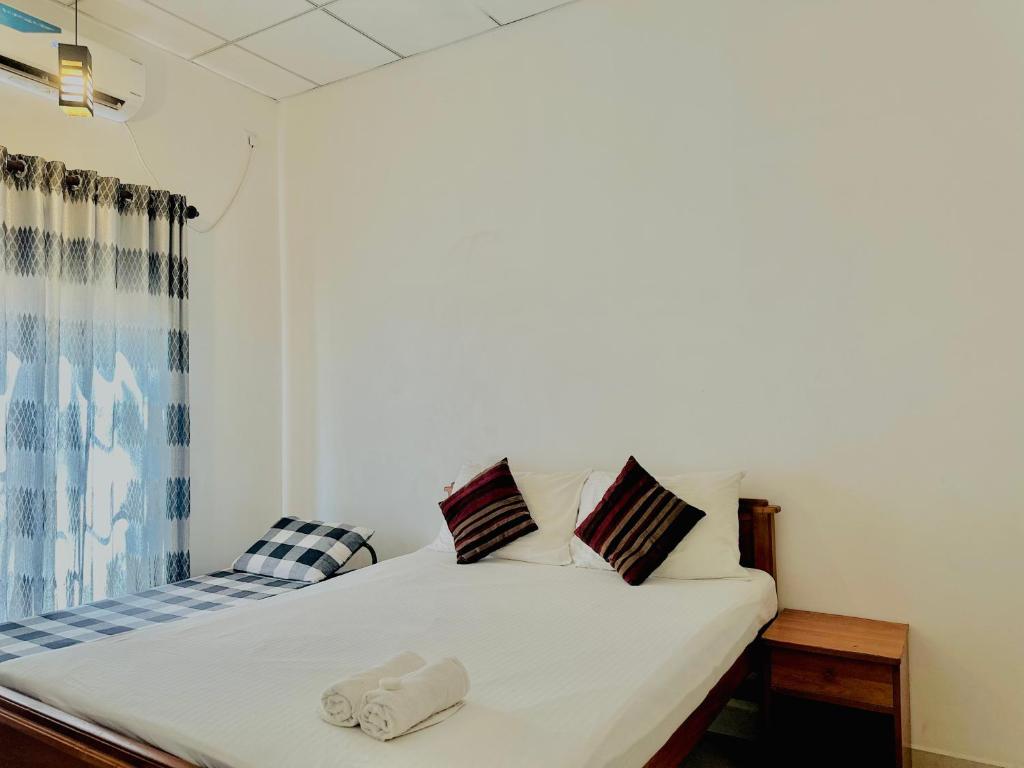 Postel nebo postele na pokoji v ubytování Hamilton Tourist Rest