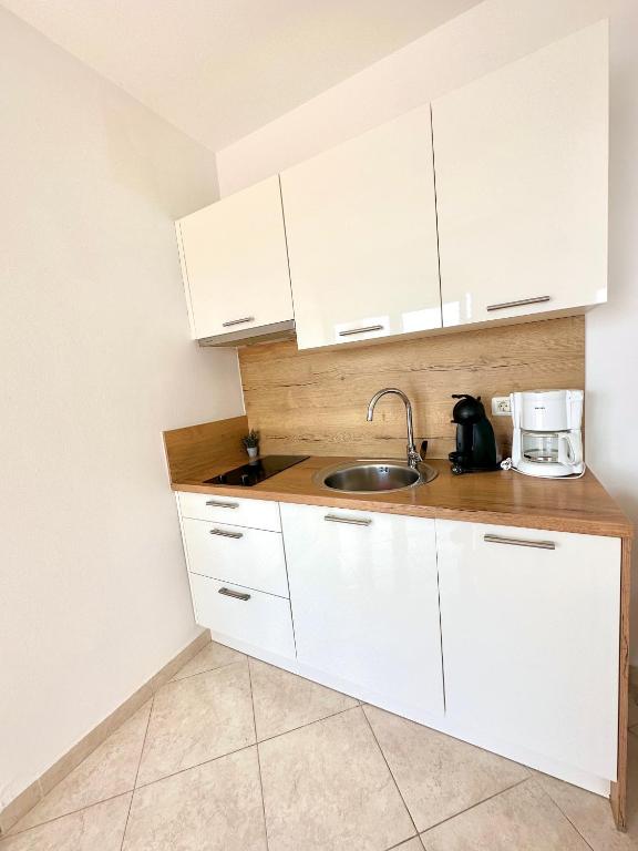 Kuchyň nebo kuchyňský kout v ubytování Villa Punta